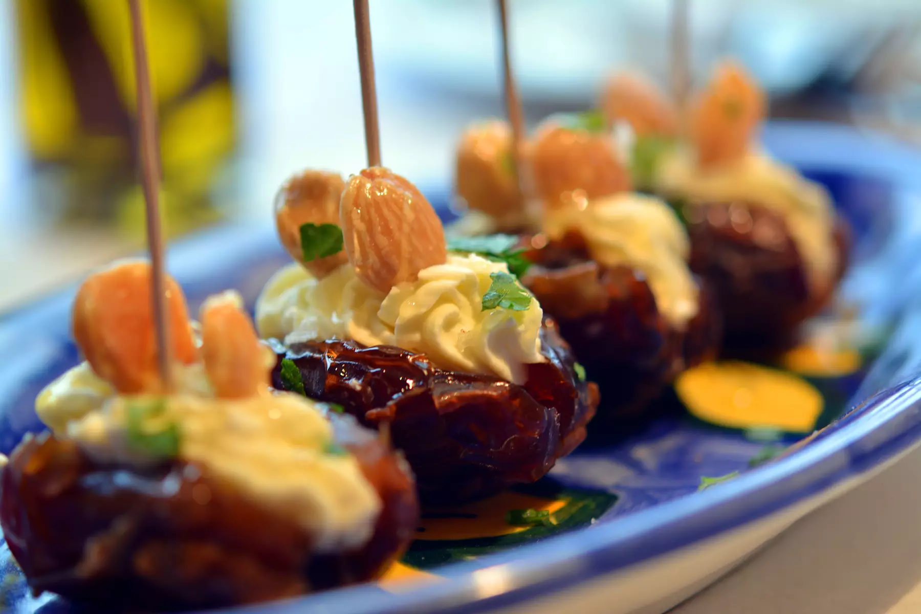 Albarino Tapas Bar - Stuffed Medjool dates with goats cheese, Marcona almonds, orange